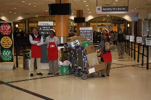 In December, chapter volunteers hand out goodies to soldiers as they head to security at the Hartsfield-Jackson Atlanta International Airport during operation Block Leave 2010.